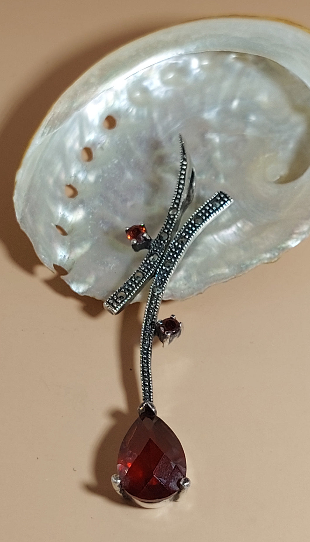 SILVER MEDALLION SMALL MARCASITES STONES , A TEAR GENUINE GRANATE IN DARK CHERRY COLOUR, 2 SMALL ROUND MARCASITES